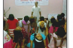 Probin Goswami teaching yoga to our students, 2009